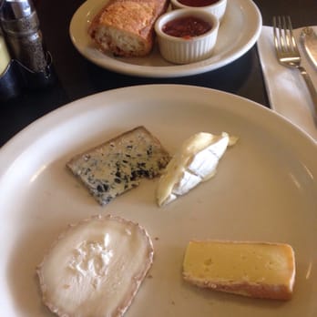 Le Pichet - Cheese plate with bread and added jelly and honey - French Near Me - Seattle, Washington Le Pichet - Cheese plate with bread and added jelly and honey - French Near Me - Seattle, Washington