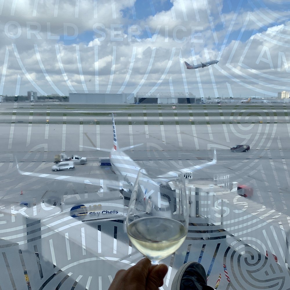 The Centurion Lounge - Sipping wine and watching AA plan taking off ...through the Amex Centurion frosted large windows - it was very nice ! - Airport Lounges Near Me - Miami, Florida The Centurion Lounge - Sipping wine and watching AA plan taking off ...through the Amex Centurion frosted large windows - it was very nice ! - Airport Lounges Near Me - Miami, Florida