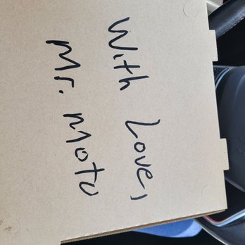 Mr Moto Pizza - The pizza box is simple but cute - Pizza Near Me - Orange, California