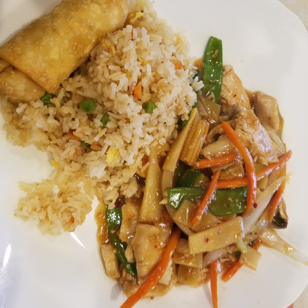 Garlic chicken with fried rice and egg roll. DECENT