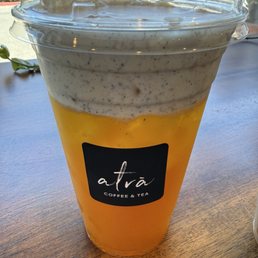 Jasmine tea mango puree with black sesame cream