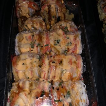 Ginban Sushi - a tray of chicken wrapped in cheese - Sushi Bars Near Me - Phoenix, Arizona