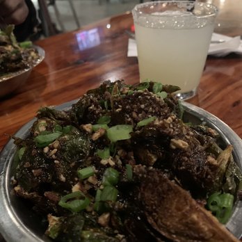 Industry - The famous Brussels sprouts!! Highly recommend ordering this. One order would be enough for two or three to eat while waiting on your meal. - New American Near Me - San Marcos, Texas