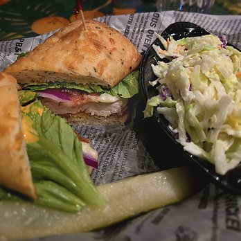 Rainforest Cafe - Blue Mountain chicken sandwich with coleslaw - American Near Me - Gurnee, Illinois Rainforest Cafe - Blue Mountain chicken sandwich with coleslaw - American Near Me - Gurnee, Illinois