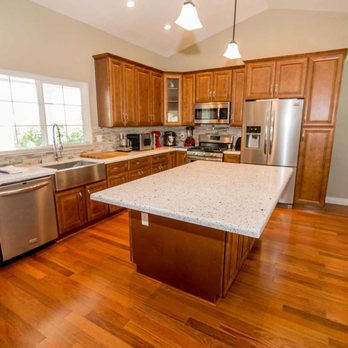 Tibi Home Design - a kitchen with a center island - General Contractors Near Me - San Diego, California Tibi Home Design - a kitchen with a center island - General Contractors Near Me - San Diego, California