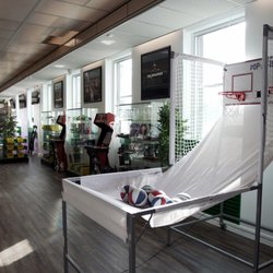 Shawn Kemp's Cannabis - SODO - Basketball hoop and games inside