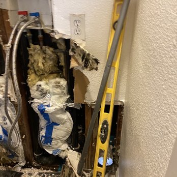 Prime Alternative - The wall we had to knock down with the mold - Plumbing Near Me