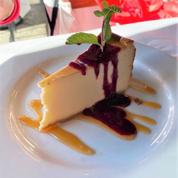 Bella Siena - New York Cheesecake with Raspberry port coulis. Yummy! - Italian Near Me - Benicia, California