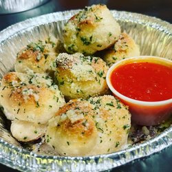 Reno's Pizza - Garlic knots made fresh daily
