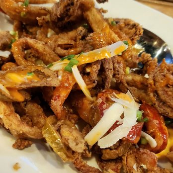 Salute - Calamari with sriracha honey drizzle - Italian Near Me - Rocky Hill, Connecticut Salute - Calamari with sriracha honey drizzle - Italian Near Me - Rocky Hill, Connecticut