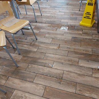 Wendy's - Puddles and wet floor sign. I think the chairs are lined up to block seating. - Fast Food Near Me - Noblesville, Indiana Wendy's - Puddles and wet floor sign. I think the chairs are lined up to block seating. - Fast Food Near Me - Noblesville, Indiana
