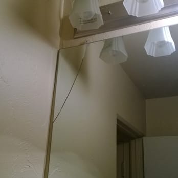 Lake Pointe - Cracked mirror/burnt out bulbs - at time of move in. - Apartments Near Me - Minneapolis, Minnesota
