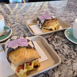 cheddar and chive egg n cheese biscuit, everything biscuit bacon, egg n cheese, and 2 cappuccinos cheddar and chive egg n cheese biscuit, everything biscuit bacon, egg n cheese, and 2 cappuccinos