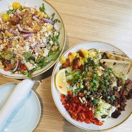 Greek salad on left, and big salad with grilled tofu