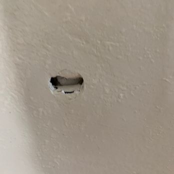 Clutter - Hole in wall - Self Storage Near Me