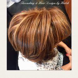 Reddish brown base with caramel highlights.