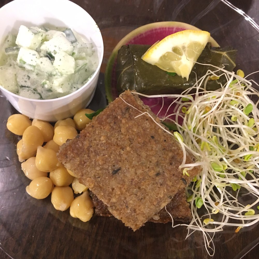 Sassool - Chunky tzatziki, stuffed grape leaves, and kibbeh (ground meat and nut patty). (Sampler plate for an event) - Mediterranean Near Me - Cary, North Carolina Sassool - Chunky tzatziki, stuffed grape leaves, and kibbeh (ground meat and nut patty). (Sampler plate for an event) - Mediterranean Near Me - Cary, North Carolina