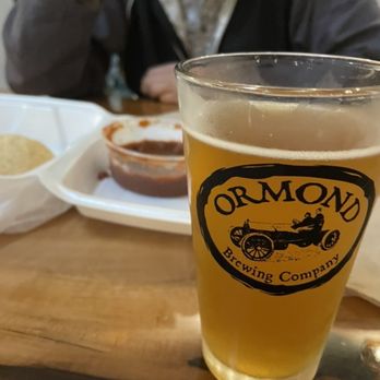 Ormond Brewing Company - Beer, chips and salsa in the background - Breweries Near Me - Ormond Beach, Florida
