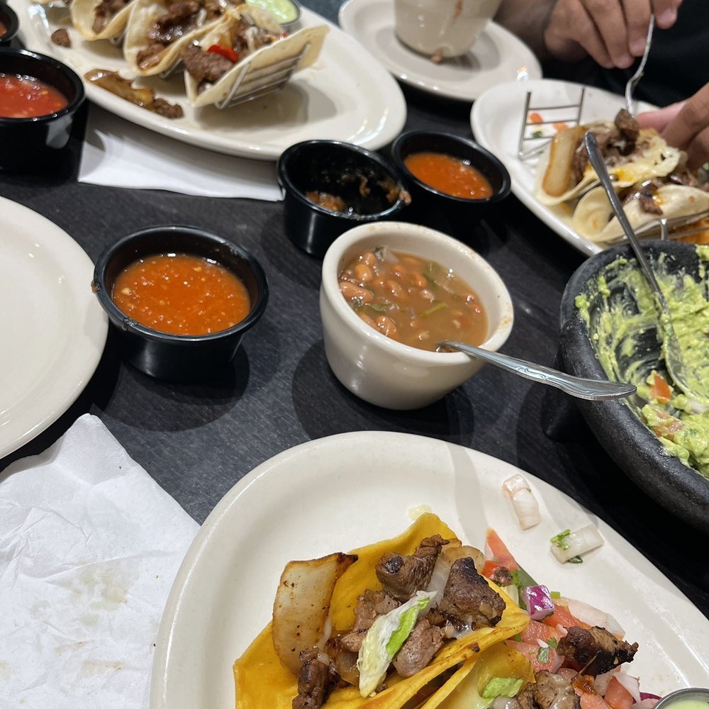 Villa Grande Mexican Restaurant - plates of food on a table - Tex-Mex Near Me - Gainesville, Texas Villa Grande Mexican Restaurant - plates of food on a table - Tex-Mex Near Me - Gainesville, Texas