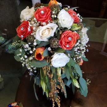 Pittsburg Florist - Vanessa did a beautiful job in creating this classy bridal bouquet with a touch of bling-bling for my niece. - Florists Near Me - Pittsburg, California