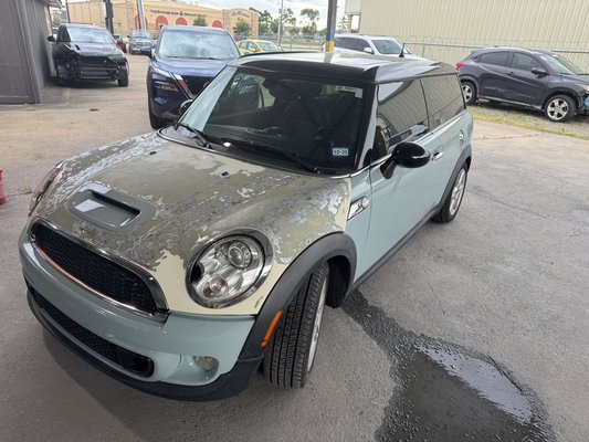 Mini Cooper Hood Restoration - Hood was wrapped poorly initially and we stripped it, cleaned up the rust, sanded, primed and painted it. Mini Cooper Hood Restoration - Hood was wrapped poorly initially and we stripped it, cleaned up the rust, sanded, primed and painted it.