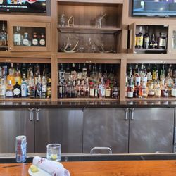 Bar area with alcohol selection.