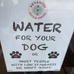 Advanced Repair Center - Dog water sign