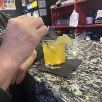 404 Sports Bar - My luv stirring his drink - American Near Me - Morrow, Georgia