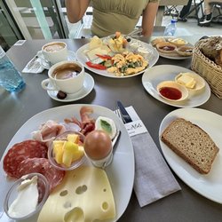 Dritan Alsela Coffee - But breakfast. Big coffee. In the back, fresh breakfast