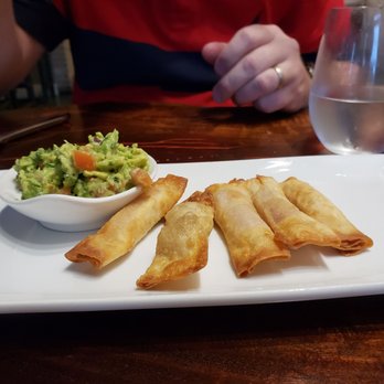 Villa Peru - Appetizers get $2 off during happy hour. This is the ham and cheese wrapped wonton served with guac...delish - Peruvian Near Me - Tucson, Arizona
