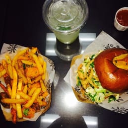 Pulled pork masterpiece with assortment of fried and homemade lemonade and special spicy ketchup! Pulled pork masterpiece with assortment of fried and homemade lemonade and special spicy ketchup!