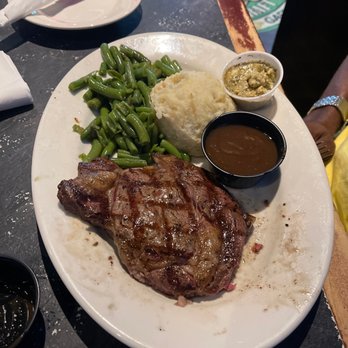 Cleveland Draft House - Garner - 12oz Ribeye steak well done with potatoes, gravy and string beans - Burgers Near Me - Garner, North Carolina Cleveland Draft House - Garner - 12oz Ribeye steak well done with potatoes, gravy and string beans - Burgers Near Me - Garner, North Carolina