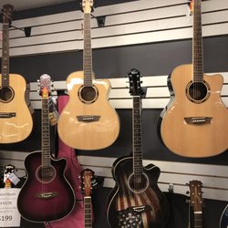 Guitarasaur Guitars & Ukuleles - Electric and Acoustic Guitars