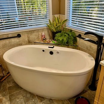 LCS Residential Construction Services - a bathtub in a bathroom - General Contractors Near Me LCS Residential Construction Services - a bathtub in a bathroom - General Contractors Near Me
