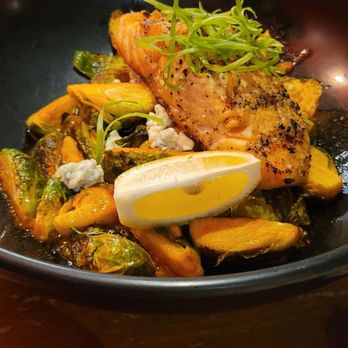 The Little Darlin' - Up close Salmon over Brussel sprouts - American Near Me - Austin, Texas The Little Darlin' - Up close Salmon over Brussel sprouts - American Near Me - Austin, Texas