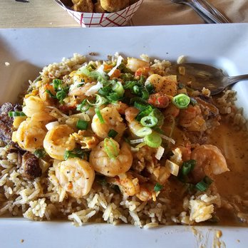 Cajun Corner - Uptown OKC - Loaded Blackened Fish with shrimp and crayfish on dirty rice. - Cajun/Creole Near Me - Oklahoma City, Oklahoma Cajun Corner - Uptown OKC - Loaded Blackened Fish with shrimp and crayfish on dirty rice. - Cajun/Creole Near Me - Oklahoma City, Oklahoma