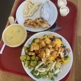 Salad, Broccoli Cheese Soup, Baked potato, pasta and a few pizza slices. Salad, Broccoli Cheese Soup, Baked potato, pasta and a few pizza slices.