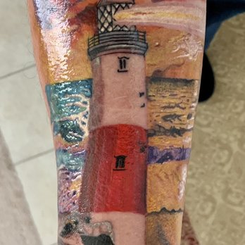 Blasted Tattoos & Piercings - Lighthouse tattoo on right forearm with the words "Be the Light" below it. - Tattoo Near Me - Mansfield, Texas