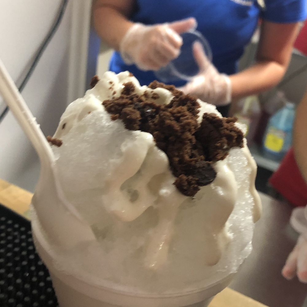 Booty Treats - Lil' Booty - Coconut shaved ice with brownies and marshmallow - Ice Cream & Frozen Yogurt Near Me - Nags Head, North Carolina Booty Treats - Lil' Booty - Coconut shaved ice with brownies and marshmallow - Ice Cream & Frozen Yogurt Near Me - Nags Head, North Carolina