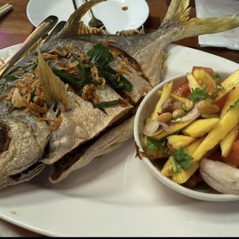 Na Rath Restaurant - Deep-Fried Golden Pompano Fish with Mango Salad - Thai Near Me - Elmhurst, New York Na Rath Restaurant - Deep-Fried Golden Pompano Fish with Mango Salad - Thai Near Me - Elmhurst, New York