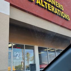 Lola's Alerations and Cleaners - It's located in the Albertson's plaza, on Eastern and Warm Springs.