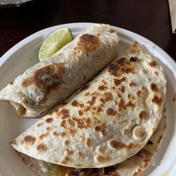 Tacos Chukis - Al pastor quesadilla and carne asada small burrito - Tacos Near Me - Seattle, Washington Tacos Chukis - Al pastor quesadilla and carne asada small burrito - Tacos Near Me - Seattle, Washington