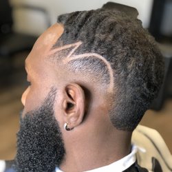 Houston Barber Life - Mid bald fade w/design