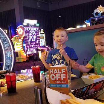 Dave & Buster's Myrtle Beach - Kids enjoying food. - American Near Me - Myrtle Beach, South Carolina