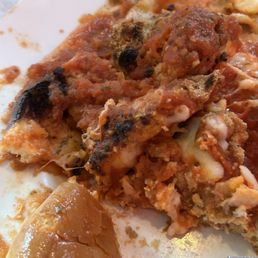 Burnt chicken, gross hamburger bun, Parmesan  With sour tomato sauce