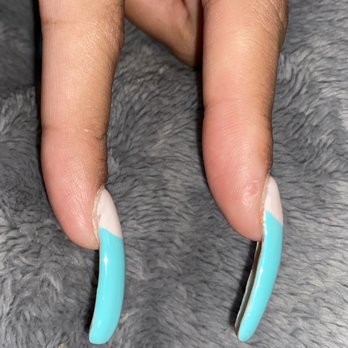 Moschino Nails - Index finger again.. filing poorly done... Right - curves ? - Nail Salons Near Me - Roseville, California Moschino Nails - Index finger again.. filing poorly done... Right - curves ? - Nail Salons Near Me - Roseville, California