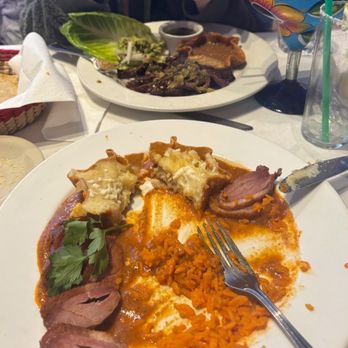 Manchamanteles Restaurant - Pato enchipotlado (steak tacos al carbón in the background) - Mexican Near Me - Chicago, Illinois