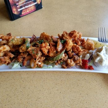 Chason's - Calamari with onions & bell peppers... HEAVILY COATED in a seasoning powder making it difficult to eat/ inhale without choking on powder. - Seafood Near Me - Elk Grove, California Chason's - Calamari with onions & bell peppers... HEAVILY COATED in a seasoning powder making it difficult to eat/ inhale without choking on powder. - Seafood Near Me - Elk Grove, California