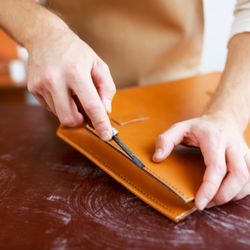 New Market Cleaners - Purse repair and leather goods, leather repair, leather cleaning