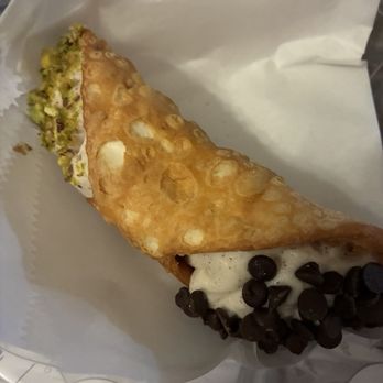Cousins Coal Fired Pizzeria - Made to order Sicilian Cannoli with choc chips and pistachios - Pizza Near Me - Wilmington, North Carolina Cousins Coal Fired Pizzeria - Made to order Sicilian Cannoli with choc chips and pistachios - Pizza Near Me - Wilmington, North Carolina